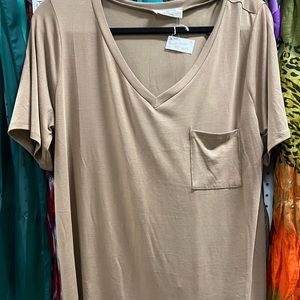 Pocket tee! Brownish in color!